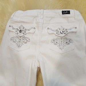 Like new white pair of diamond studd jeans